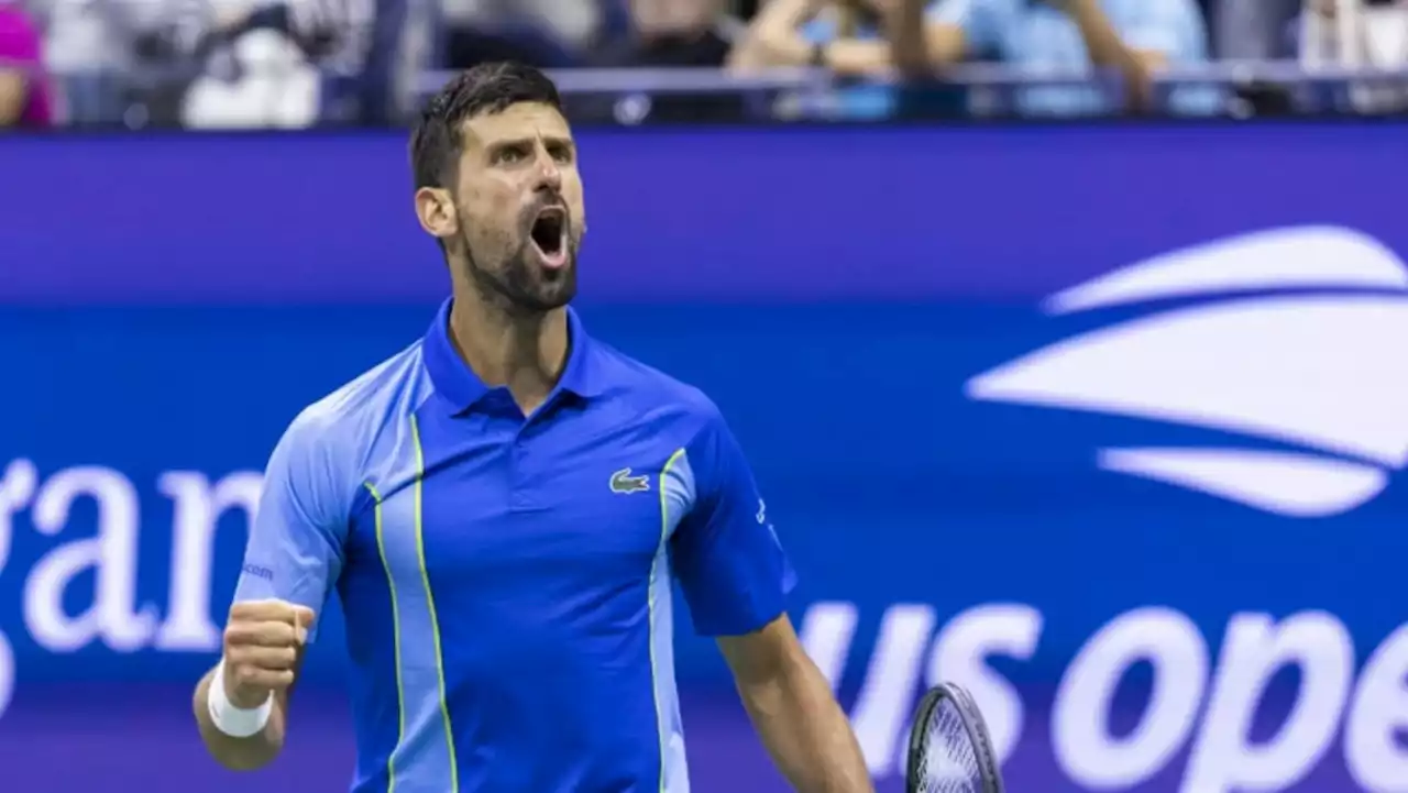 Djokovic fights back from two sets down to reach US Open final 16