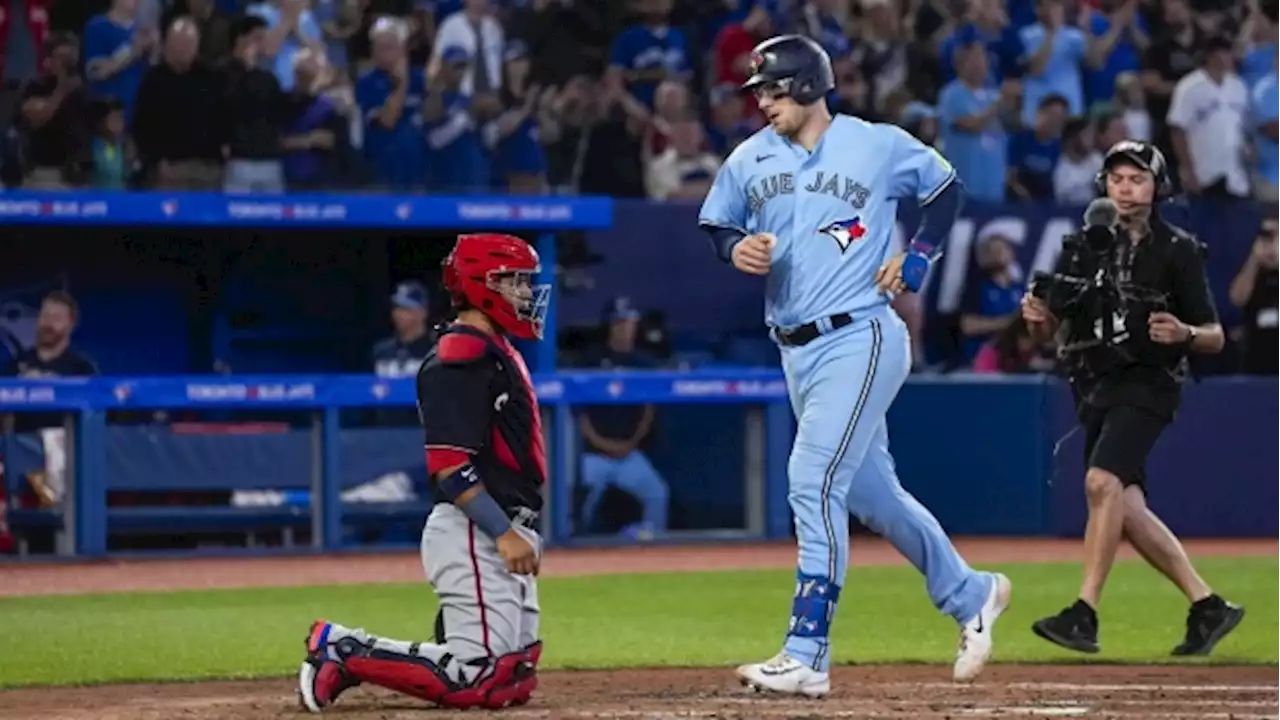 Toronto catcher Danny Jansen fractures finger in the Blue Jays' 13-9 win over the Rockies