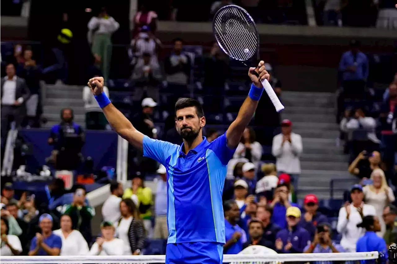 Djokovic battles back from two sets down to reach US Open last 16