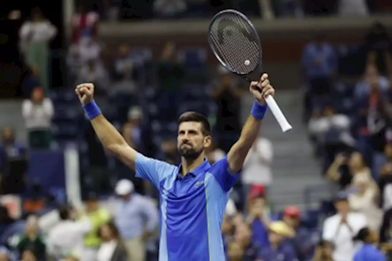 Djokovic fights back from two sets down to reach US Open final 16