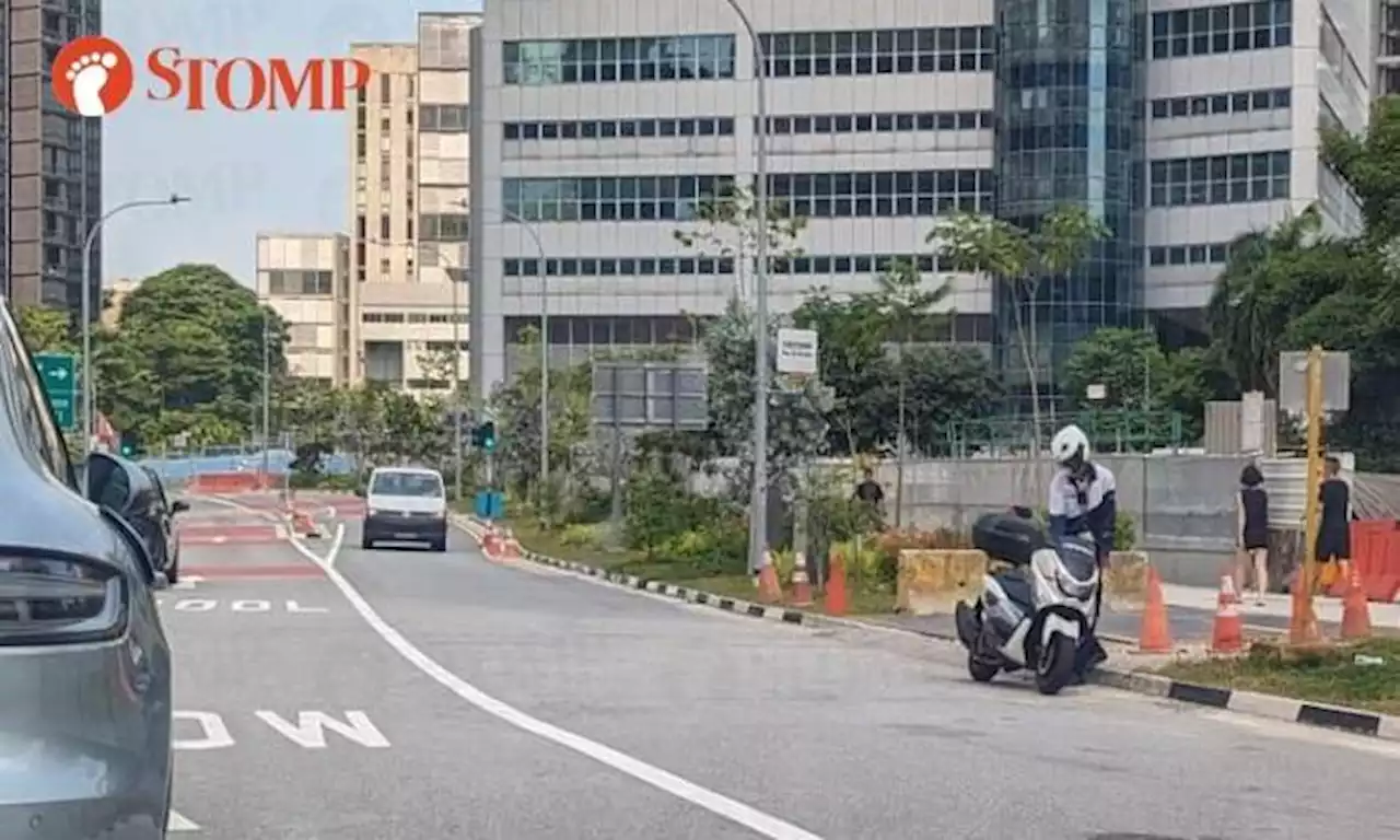 Parking warden outside River Valley polling station to catch people parking illegally to vote?