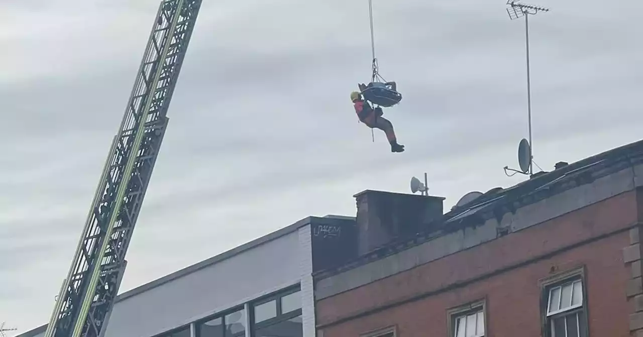 Roads closed in city centre amid rescue operation with man stuck on scaffolding