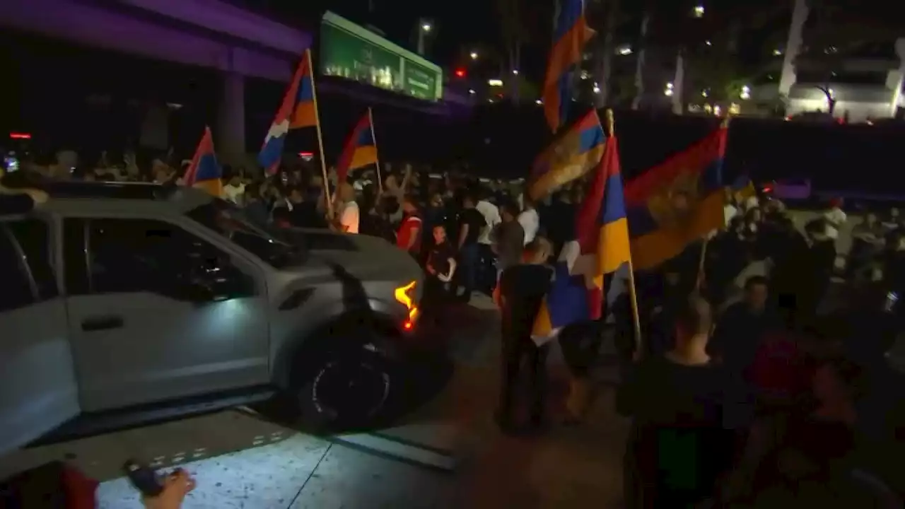 Protesters waving Armenian flags block freeway lanes in Glendale