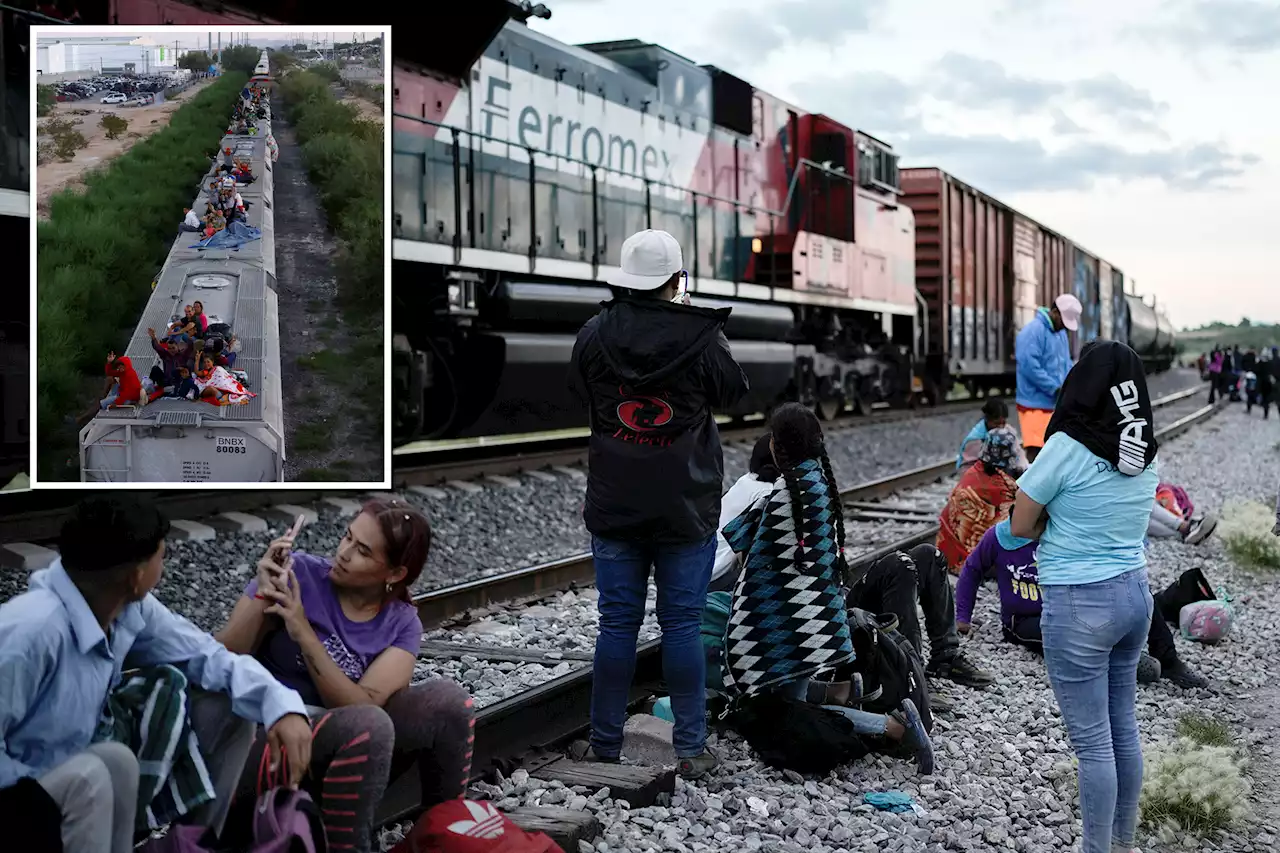 Mexican freight company stops sending trains to US border as ‘unprecedented’ number of migrants hitch rides