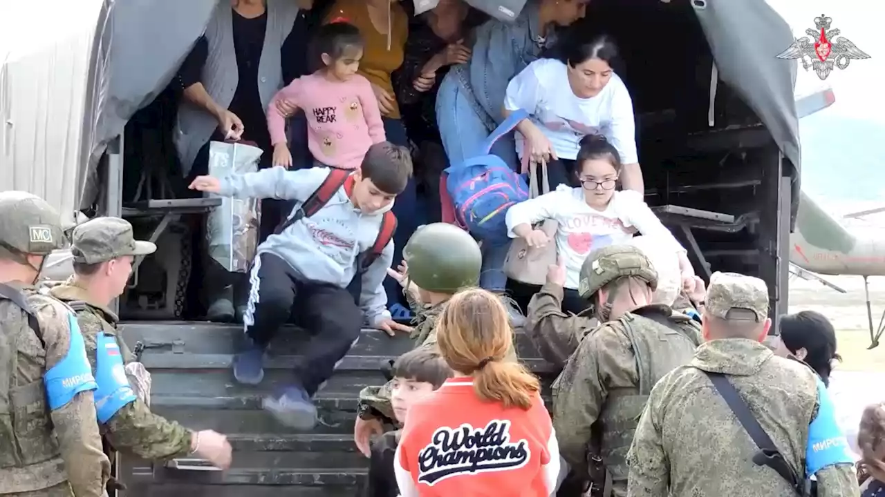 Thousands of Armenians in Karabakh mass at airport after ceasefire deal