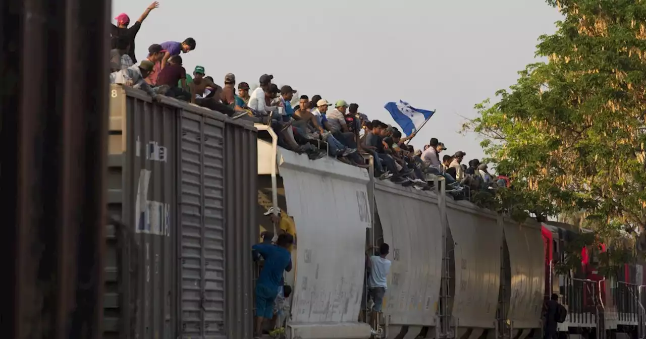Mexican railway operator halts trains because so many migrants are climbing aboard and getting hurt