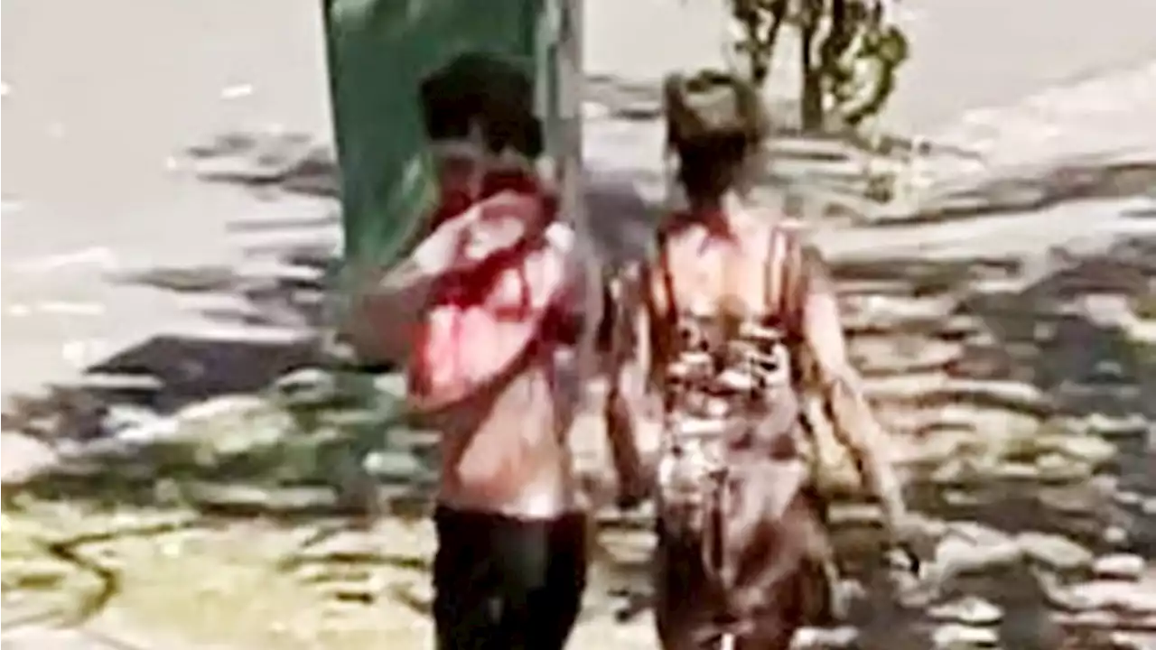 Shock video of bloodied man escaping following double stabbing in Qld