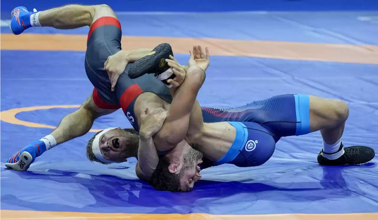 Wrestling body explains why Russian champs competed at world championships despite pro-war rally