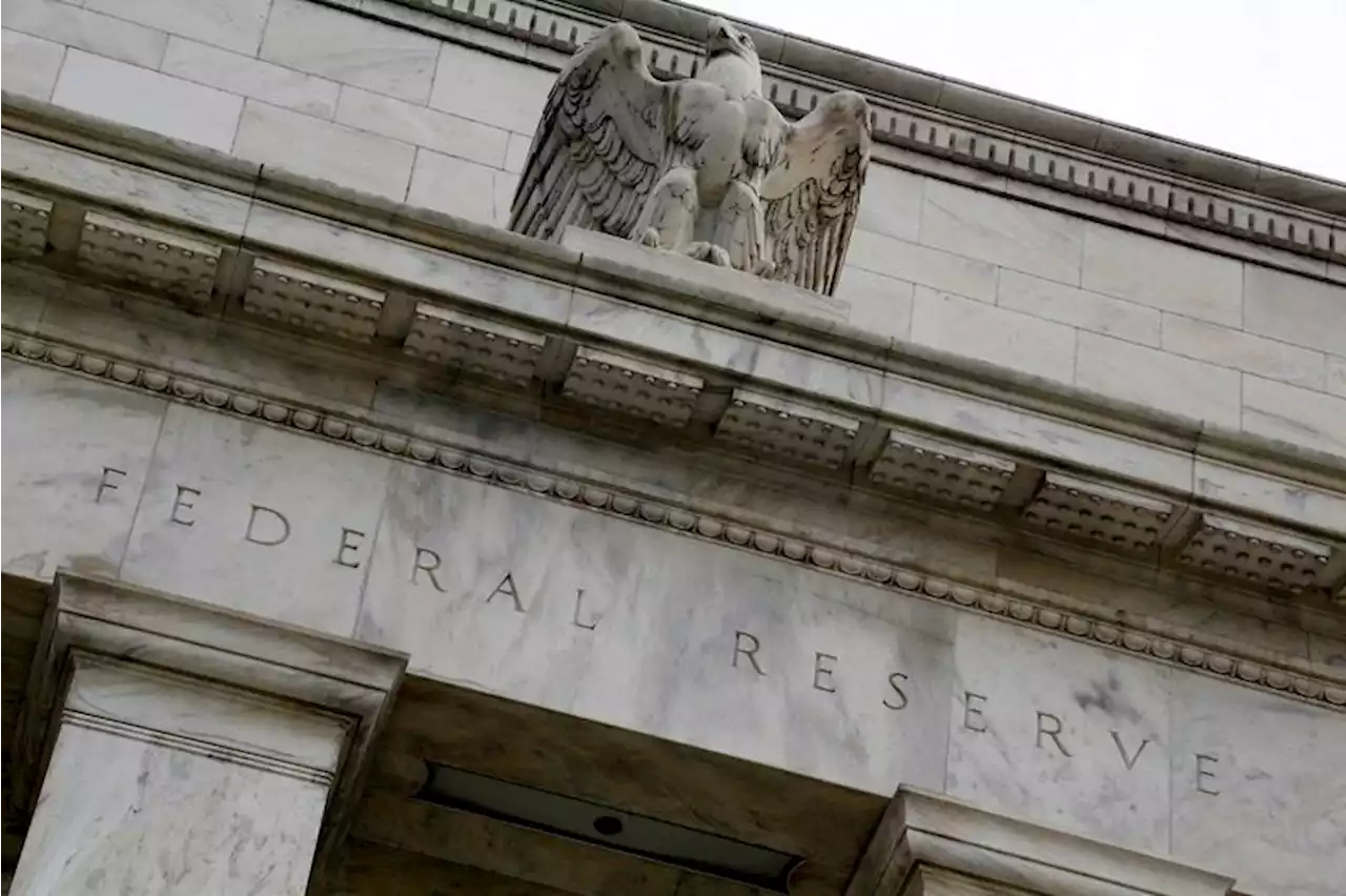 Fed leaves rates unchanged, sees tighter policy through 2024