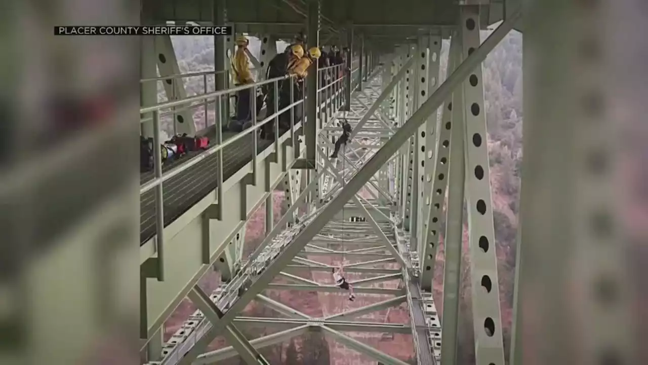 Man rescued dangling from California's highest bridge 700 feet above river