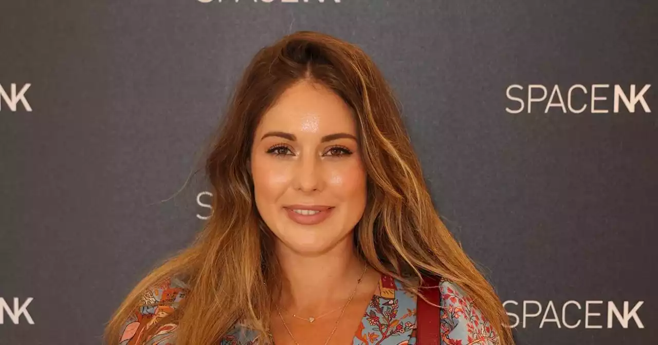 Louise Thompson smiles on night out after discussing her 'staying alive' folder