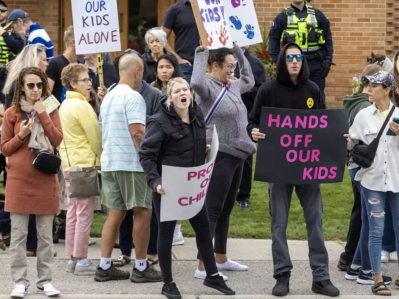 Protesters, counter-protesters converge on London school board HQ