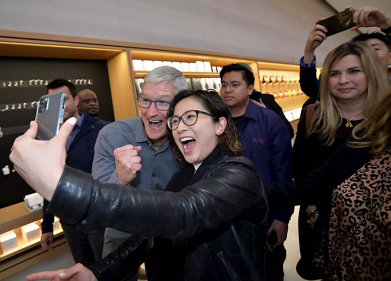 Apple CEO Tim Cook appears in NYC for iPhone 15 launch as stores draw crowds worldwide