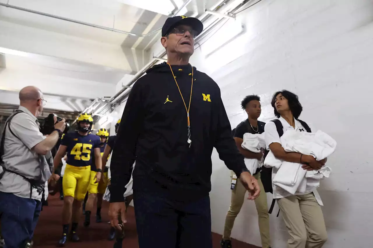 Jim Harbaugh returns from a somber goodbye and 'a place I’ve never been'