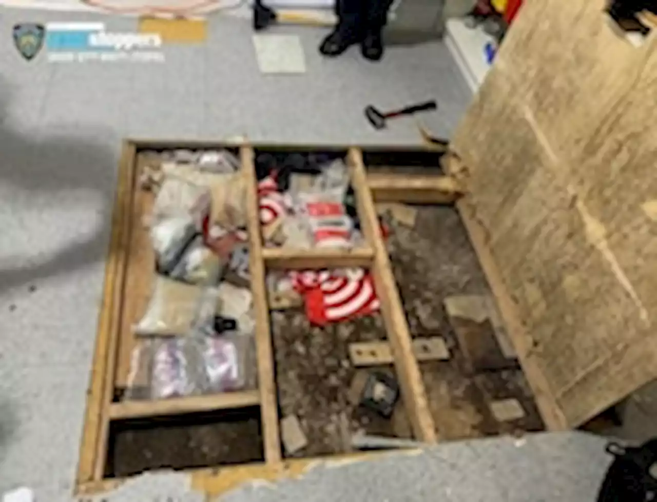 Police find more drugs behind trapdoor in day-care center after baby death