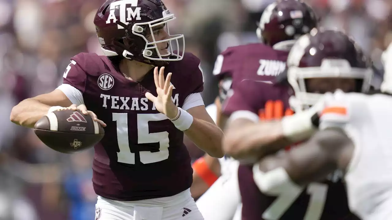 Johnson throws 2 TD passes after Weigman injured to lead Texas A&M to 27-10 win over Auburn