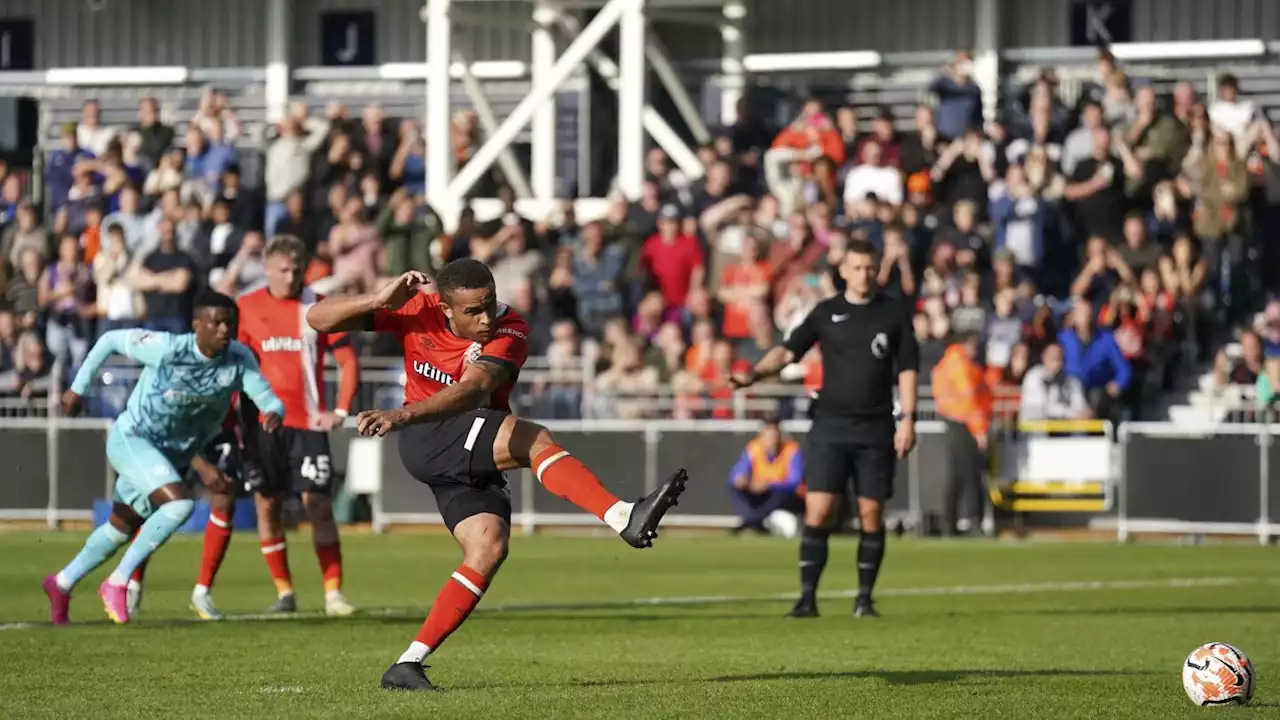 Luton earns its first Premier League point in 1-1 draw with 10-man Wolves