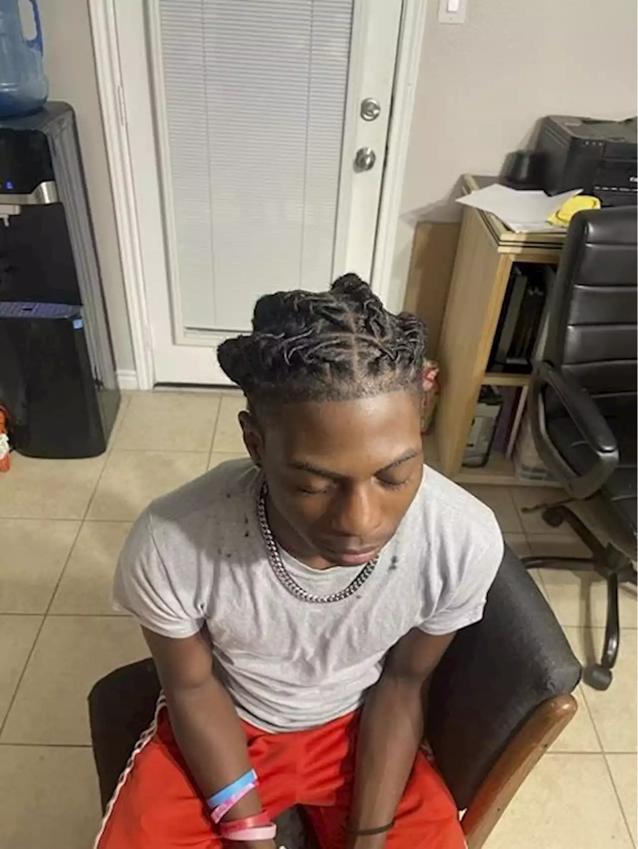 A Black student’s family sues Texas officials over his suspension for his hairstyle