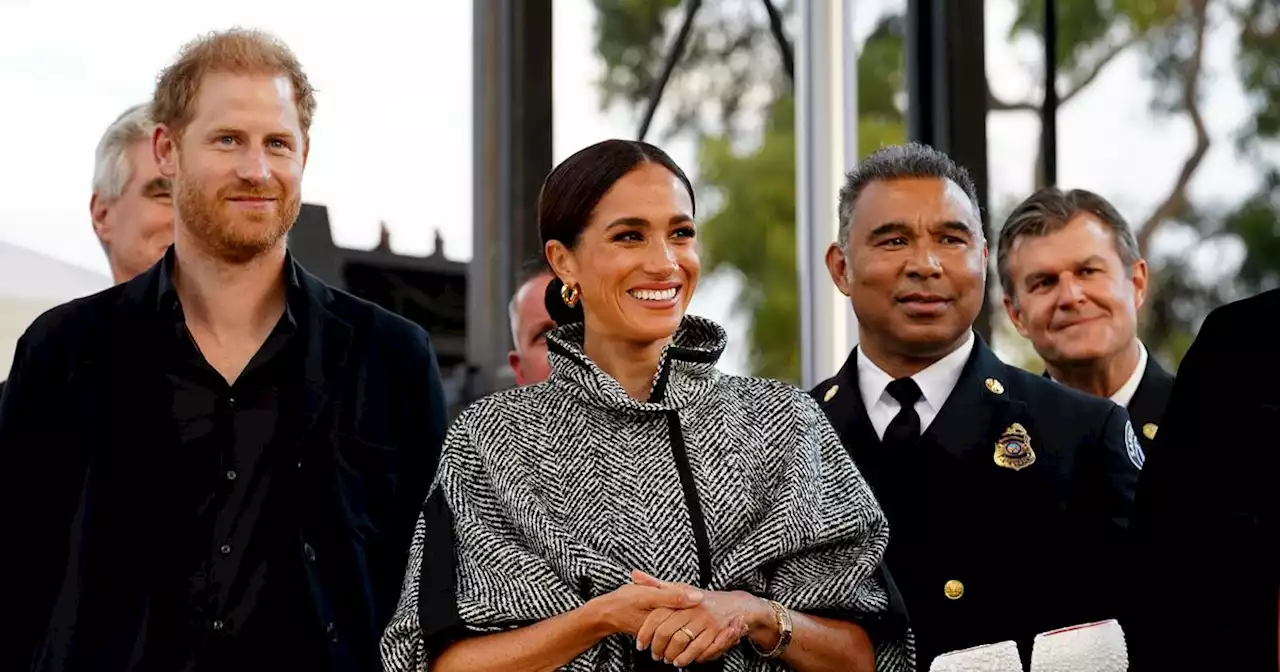 Harry and Meghan beam as they reunite with Oprah at star-studded event