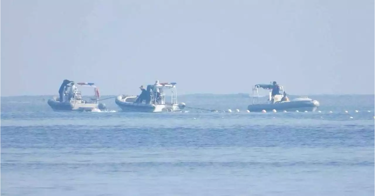 China condemned for installing floating barrier