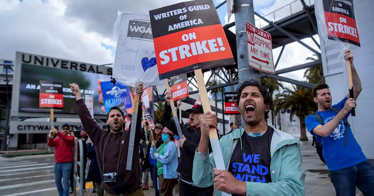 WGA, Hollywood studios close to a deal on ending writers’ strike, sources say