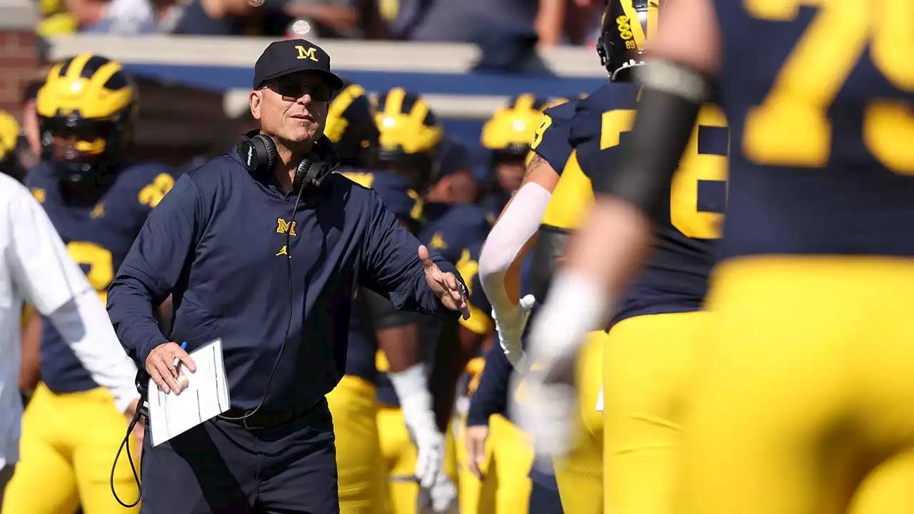 Michigan overcomes slow start to defeat Rutgers in Jim Harbaugh's return from 3-game suspension