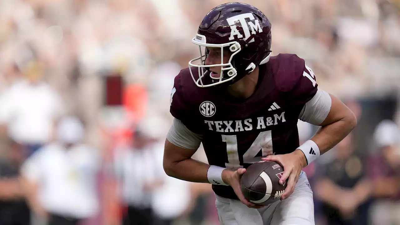 Johnson throws 2 TDs after Weigman injured to lead Texas A&M to SEC win over Auburn