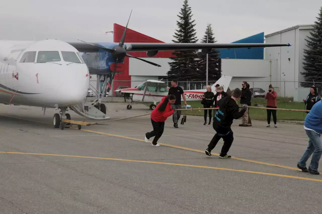 Residents test their strength at the Thunder Bay Airport