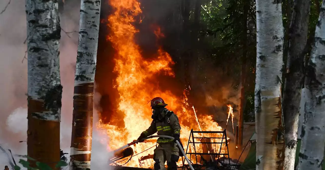 No injuries reported in fire that engulfed camp along Anchorage greenbelt