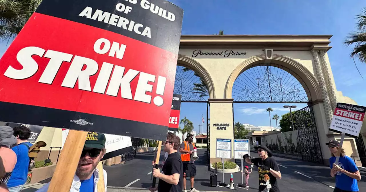 Hollywood writers, studios reach tentative deal to end strike