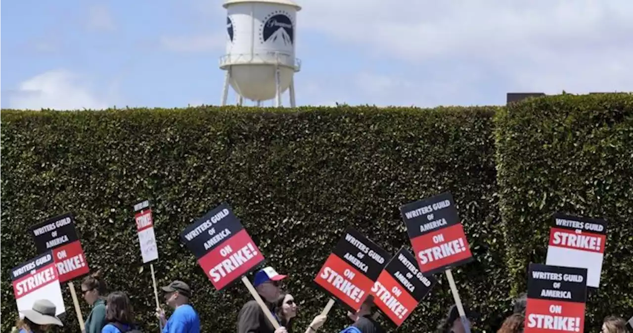 Writers Guild and Hollywood studios reach tentative deal to end strike, no deal yet for actors