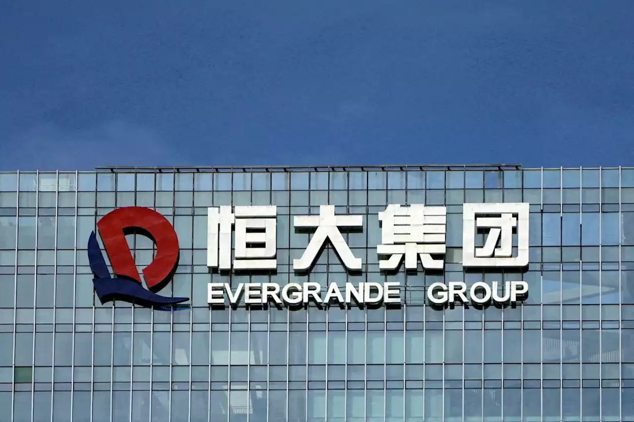 Evergrande shares sink after saying it is unable to issue new debt