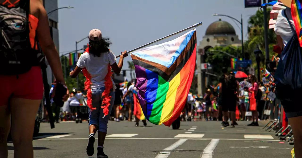 California Gov. Gavin Newsom signs bills to enhance the state's protections for LGBTQ+ people