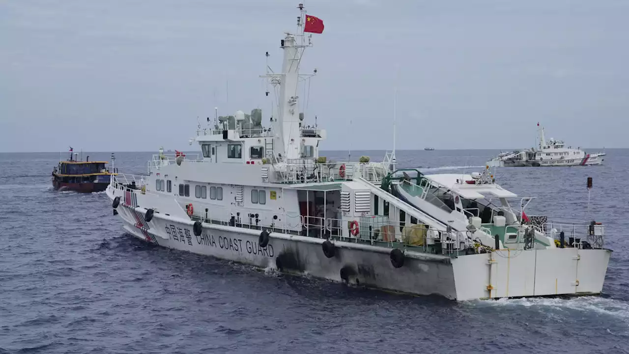 Philippines ‘to remove barrier placed by China’s coastguard at disputed lagoon’