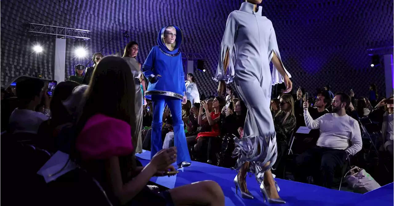 Pierre Cardin turns Communist Party HQ blue for Paris Fashion Week