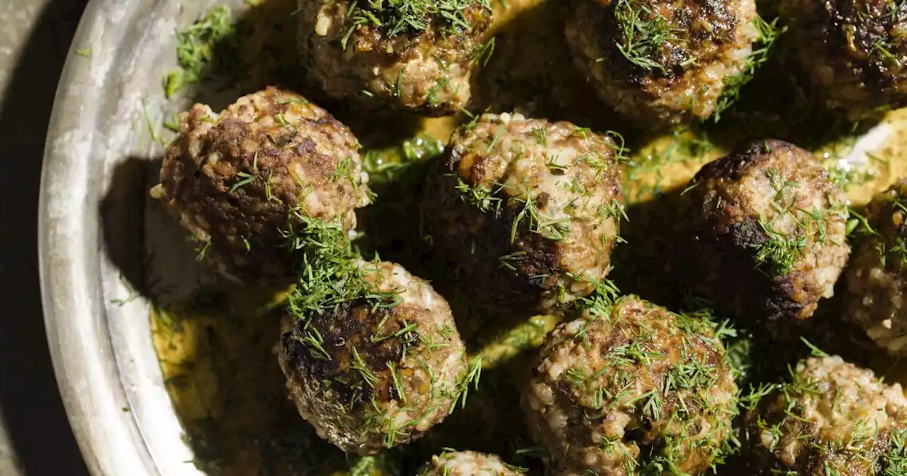 Lemony olive oil sauce enriches Greek beef and rice meatballs