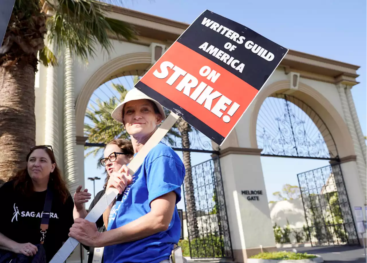 Hollywood writers reach tentative deal with studios to end historic strike