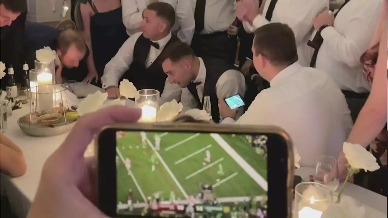 What a wedding reception looks like during the Ohio-State Notre Dame game in Buckeye Country