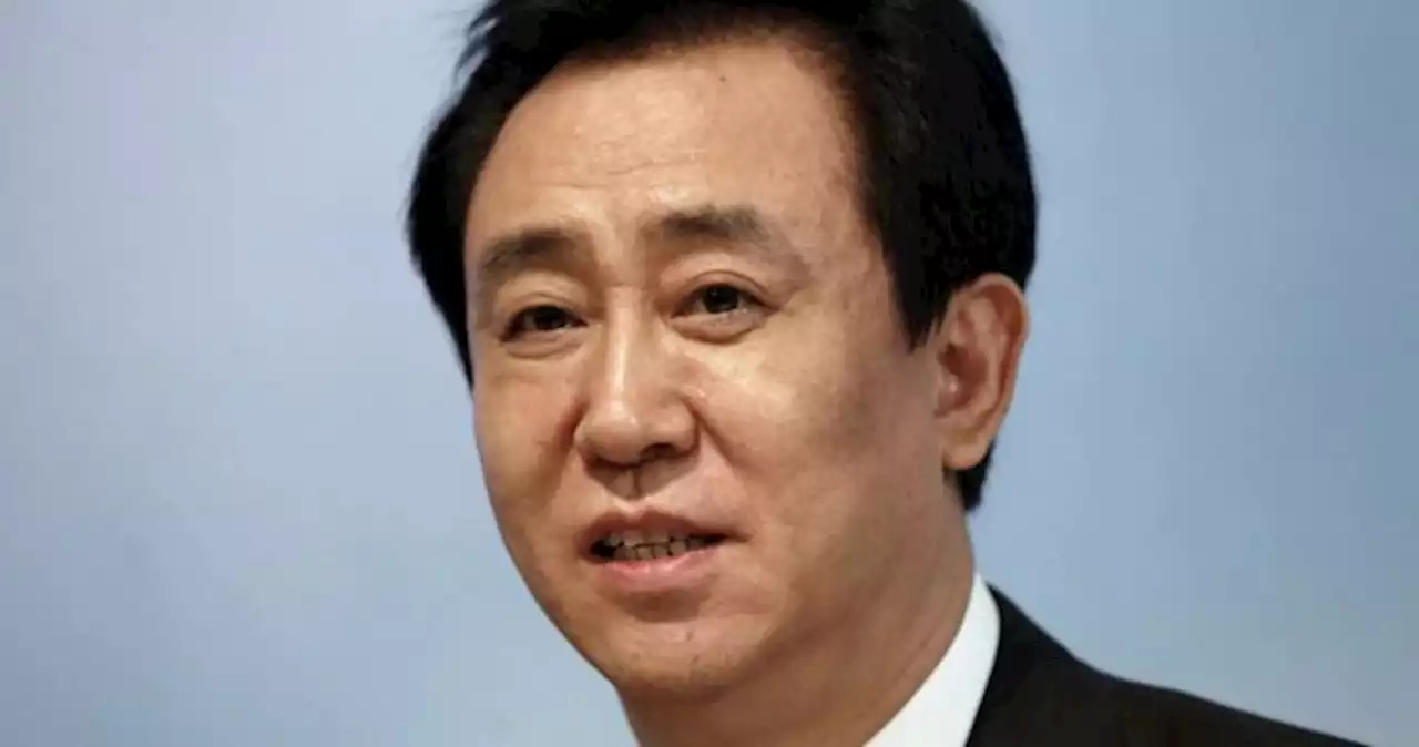 Pressure piles on Evergrande with chairman under police watch, liquidation risk