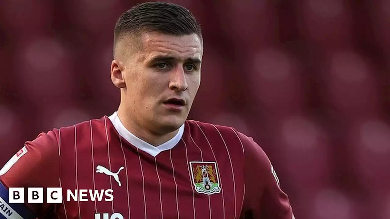 Northampton Town's Aaron McGowan plays match hours after father's death