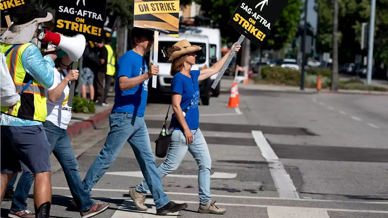 Strike over: Hollywood writers free to return to work Wednesday