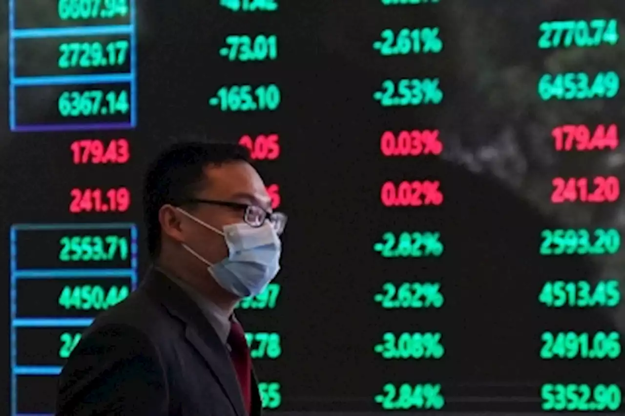 Asia stocks mixed as investors grapple with higher rates