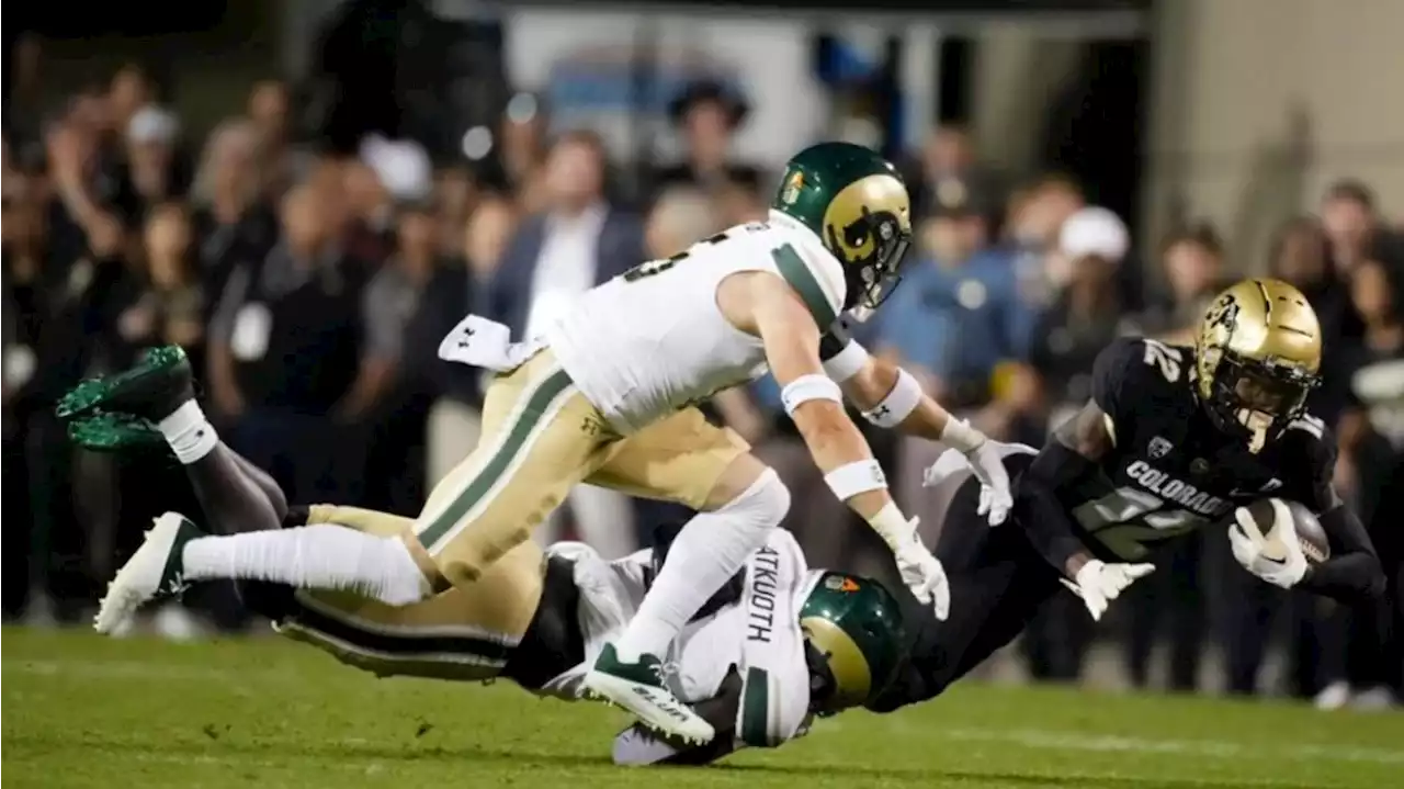 CU Buffs' Travis Hunter and CSU Rams' Henry Blackburn meet up to go bowling