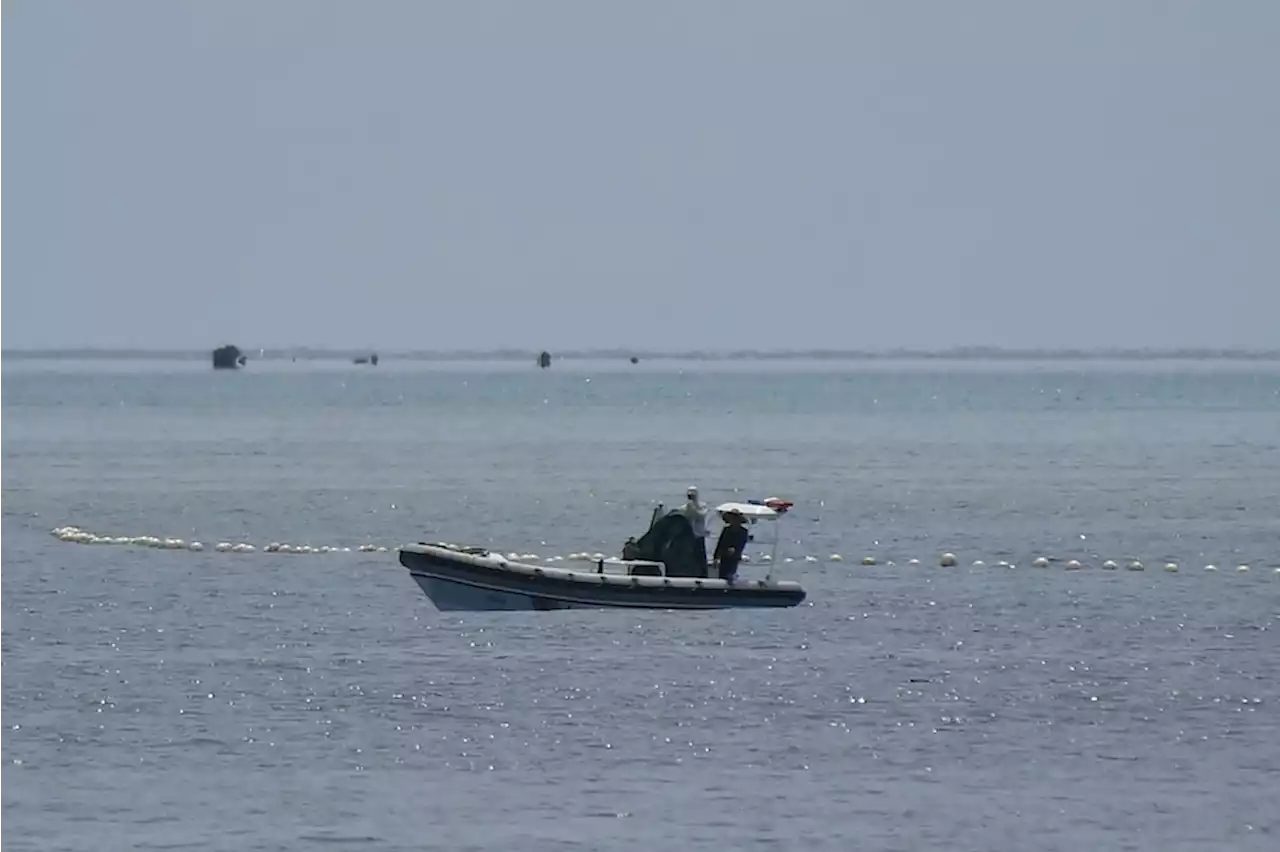 Chinese vessels in Scarborough issue radio challenges after barrier removal: PCG