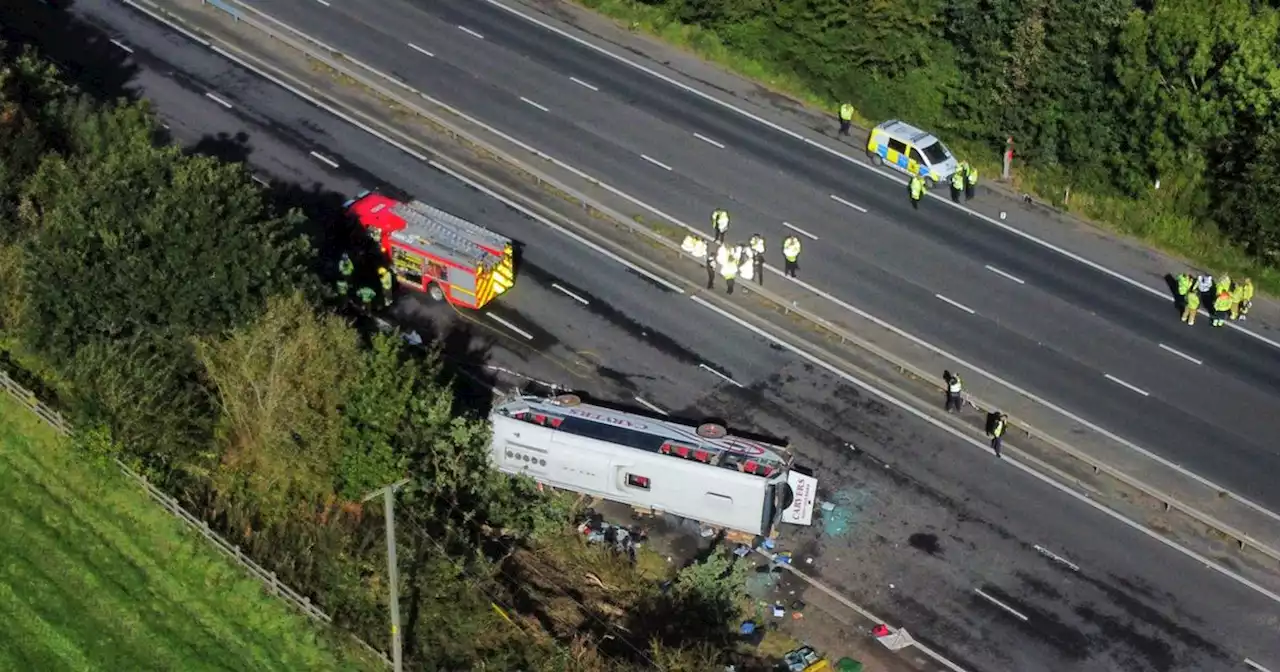 Teen girl and driver dead after horror school bus crash on motorway