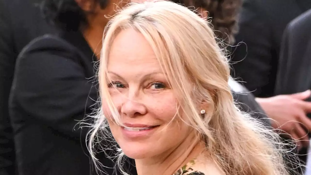 Radiant Pamela Anderson goes makeup-free wearing Victoria Beckham dress in Paris