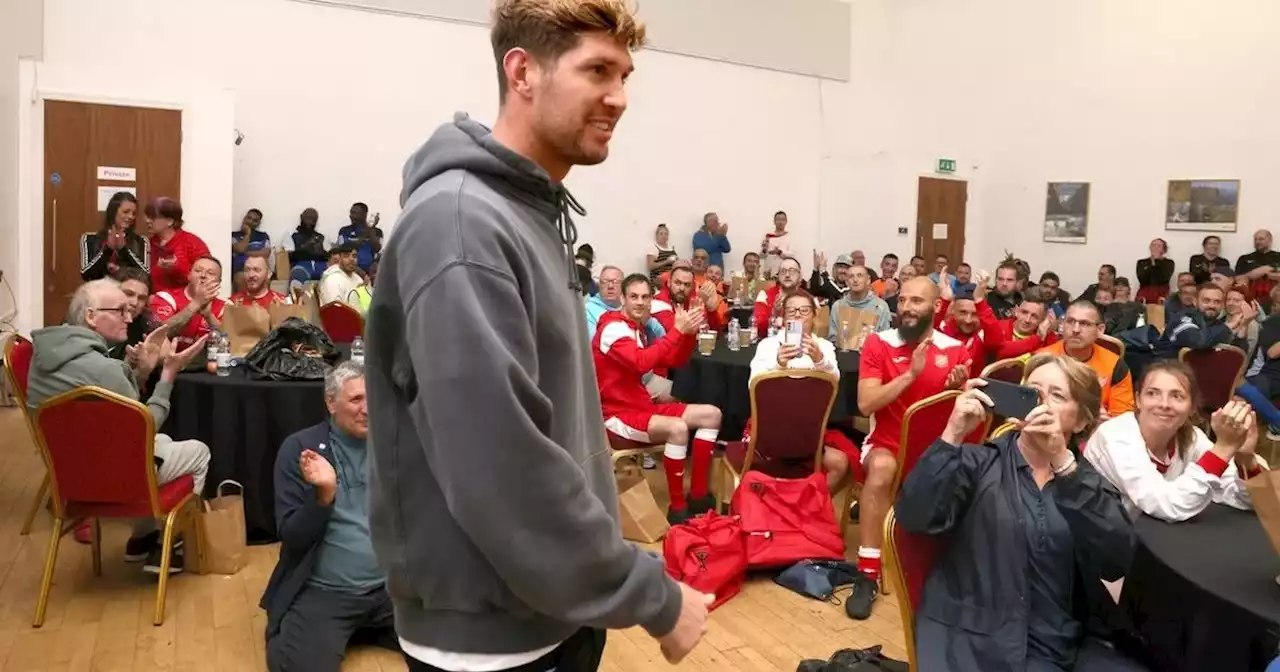 Man City star John Stones mobbed at tournament for homeless footballers