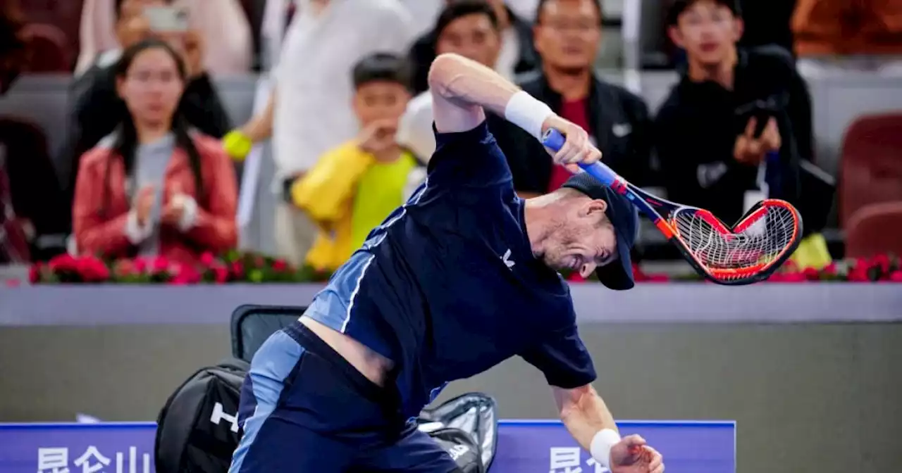 Andy Murray smashes racket and pushes camera out of his way in China Open loss