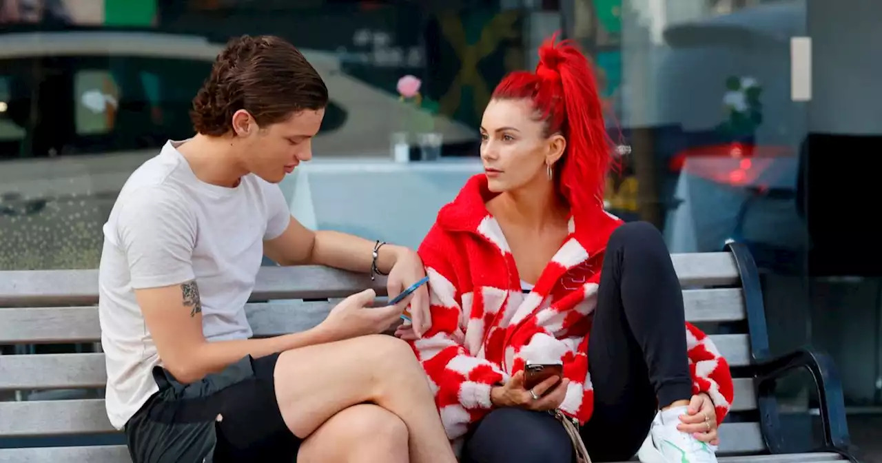 Strictly duo Bobby Brazier and Dianne Buswell look cosy as they walk arm in arm