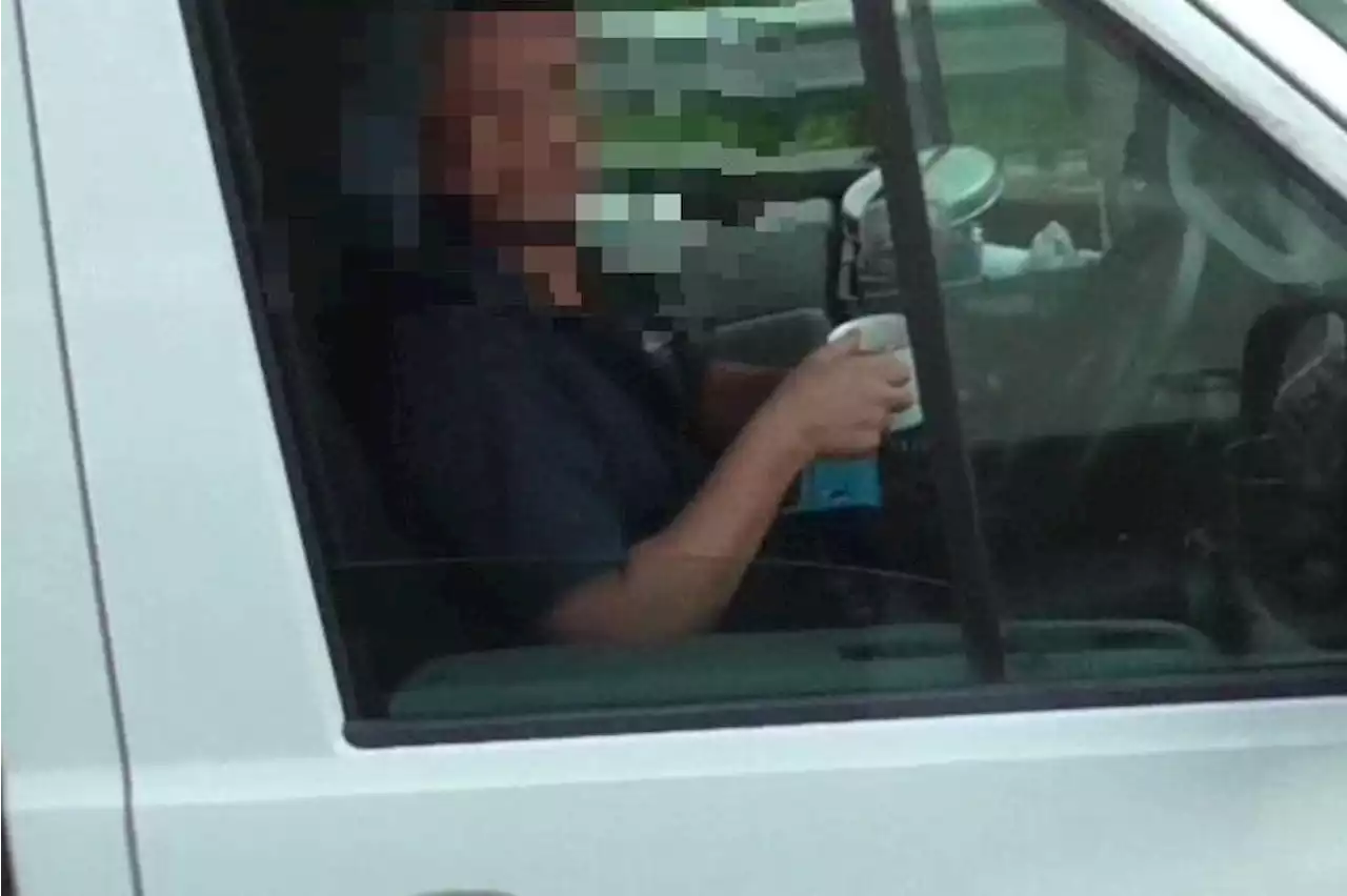 Driver slammed by officers for taking hands off wheel to drink tea by unmarked HGV